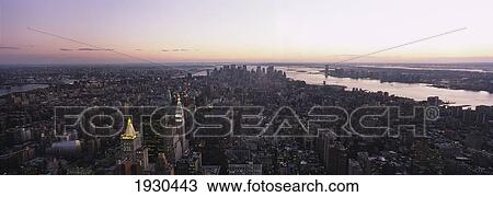Stock Image - Panoramic Aerial Shot Of Midtown Manhattan At Dusk, Looking South Towards Lower Manhattan, New York City, Usa.. Fotosearch