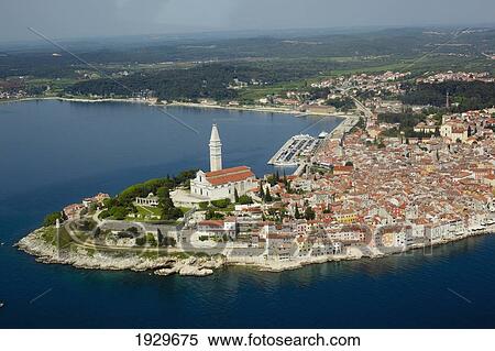 Panoramic flight over Rovinj, show St. Euphemia Parish Church, Old Town Rovinj, Istria, Croatia. View Large Photo Image Stock Photography - Panoramic flight over Rovinj, show St. Euphemia Parish Church, Old Town Rovinj, Istria, Croatia.. Fotosearch