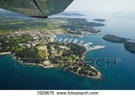 Stock Photograph - Panoramic flight over Rovinj, Vsar and the National Park, Istria, Croatia.. Fotosearch