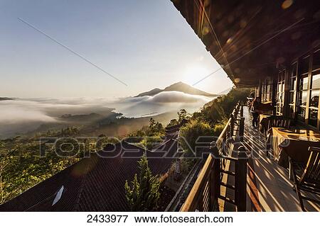 Panoramic view of Batur Lake and Mount Agung at sunrise from Kintamani, Bali, Indonesia View Large Photo Image Stock Photo - Panoramic view of Batur Lake and Mount Agung at sunrise from Kintamani, Bali, Indonesia. Fotosearch
