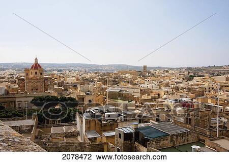 Stock Image - Panoramic View Of Victoria From The Citadel, Victoria (Rabat), Gozo Island, Malta. Fotosearch
