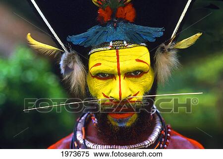 Papua New Guinea, Head Shot Of Young Man, Face With War Paint And Wild Hair View Large Photo Image Stock Photography - Papua New Guinea, Head Shot Of Young Man, Face With War Paint And Wild Hair. Fotosearch