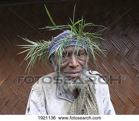 Papua New Guinea, Portrait of Highlander Wearing Headdress; Ambua View Large Photo Image Stock Photograph - Papua New Guinea, Portrait of Highlander Wearing Headdress; Ambua. Fotosearch