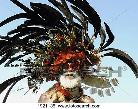 Stock Photography - Papua New Guinea, Portrait of Highlander Wearing Birds of Paradise Headdress; Lae. Fotosearch