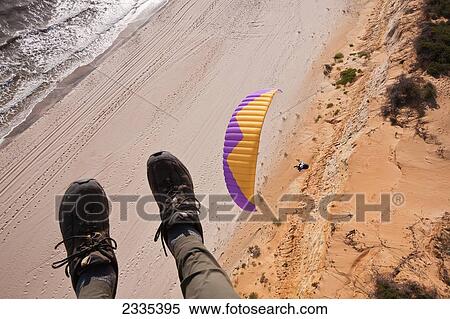 Stock Photography - Para Gliders Above Coast In Donana Nature Park; Seville, Andalucia, Spain. Fotosearch