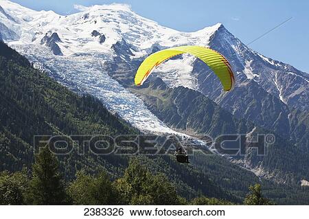 Paraglider above Chamonix-Mont Blanc valley; France View Large Photo Image Stock Photograph - Paraglider above Chamonix-Mont Blanc valley; France. Fotosearch
