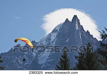 Stock Photography - Paraglider above Chamonix-Mont Blanc valley; France. Fotosearch