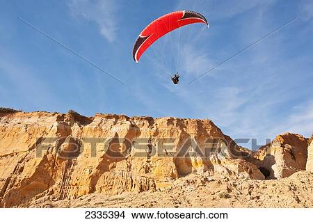 Picture - Paraglider Above Coast In Donana Nature Park; Seville, Andalucia, Spain. Fotosearch