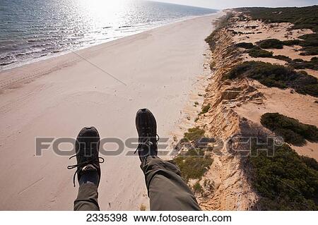 Stock Photo - Paraglider Above Coast In Donana Nature Park; Seville, Andalucia, Spain. Fotosearch