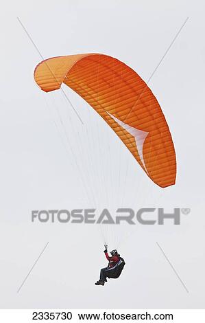 Paragliding Above Newgale Beach Along Pembrokeshire Coast Path Near St David's; Wales, Uk View Large Photo Image Stock Image - Paragliding Above Newgale Beach Along Pembrokeshire Coast Path Near St David's; Wales, Uk. Fotosearch