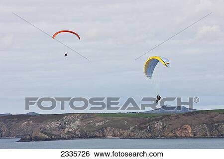 Paragliding Above Newgale Beach Along Pembrokeshire Coast Path Near St David's; Wales, Uk View Large Photo Image Stock Photograph - Paragliding Above Newgale Beach Along Pembrokeshire Coast Path Near St David's; Wales, Uk. Fotosearch