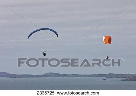 Stock Photography - Paragliding Above Newgale Beach Along Pembrokeshire Coast Path Near St David's; Wales, Uk. Fotosearch