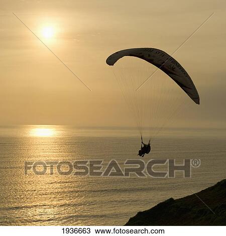 Paragliding In Tandem At Sunset; Miraflores District Peru View Large Photo Image Stock Image - Paragliding In Tandem At Sunset; Miraflores District Peru. Fotosearch