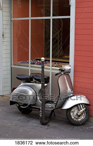 Paris, France; Motor Scooter Outside Storefront View Large Photo Image Stock Image - Paris, France; Motor Scooter Outside Storefront. Fotosearch