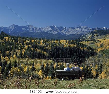 Picture - Park Bench Overlooking Rocky Mountains, Kananaskis, Alberta, Canada. Fotosearch