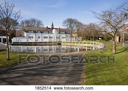 Picture - Park Pathway And Pond, Tyne And Wear, England. Fotosearch