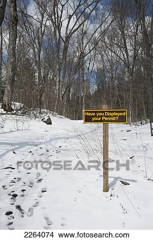 Picture - Parking Permit Reminder Sign At Entrance To Oxtongue River - Ragged Falls Provincial Park; Huntsville Ontario Canada. Fotosearch