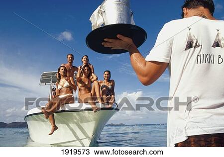 Stock Image - Party People On Boat With Champagne. Fotosearch