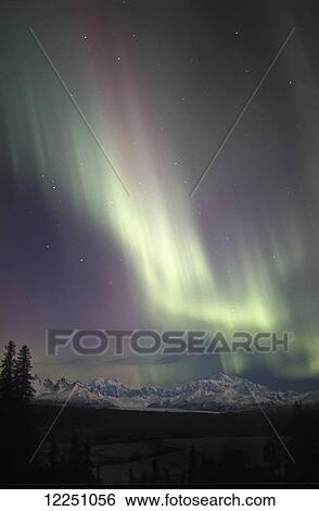 Stock Photograph - Pastel aurora above Mount McKinley; Alaska, United States of America. Fotosearch