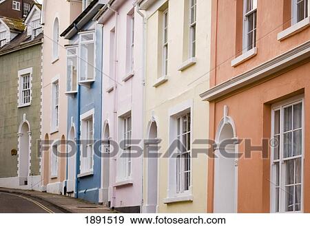 Stock Photo - Pastel Coloured Traditional Style Houses In Resort Village Of Salcombe. Fotosearch