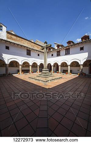 Stock Image - Patio de la Cruz (courtyard of the Cross) in San Diego Convent Museum, Quito, Pichincha, Ecuador. Fotosearch