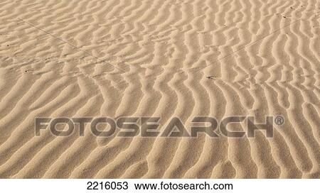 Stock Image - Patterns In The Sand On Bouznika Beach In Morocco, Bouznika Beach, Morocco. Fotosearch