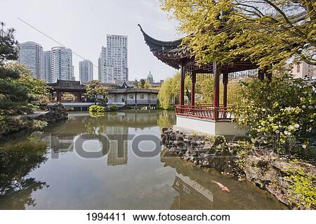 Stock Image - Pavilion By The Pond In Dr. Sun Yat Sen Park In Chinatown, Vancouver, British Columbia, Canada. Fotosearch