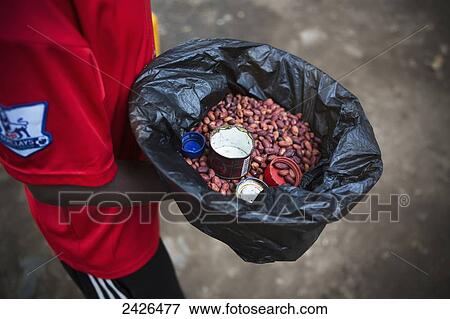 Stock Photo - Peanut seller; Gambella, Ethiopia. Fotosearch