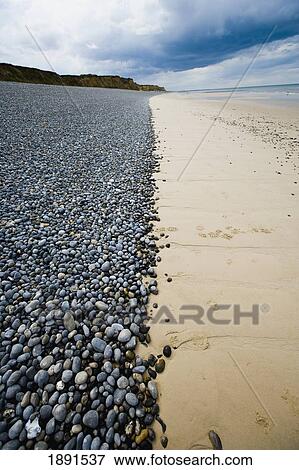Stock Photo - Pebble And Sand Split Beach. Fotosearch