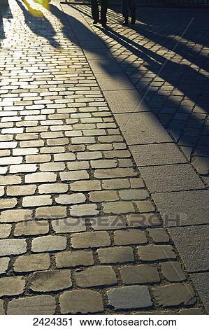 Pedestrian shadows cast on a walkway; Paris, France View Large Photo Image Stock Image - Pedestrian shadows cast on a walkway; Paris, France. Fotosearch