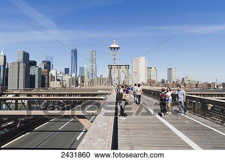 Stock Image - Pedestrian walkway on the Brooklyn Bridge, New York City, New York, United States. Fotosearch