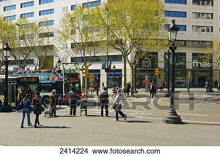 Pedestrians and a bus on a busy street; Barcelona, Spain View Large Photo Image Picture - Pedestrians and a bus on a busy street; Barcelona, Spain. Fotosearch
