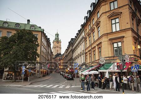 Stock Photo - Pedestrians And Cars On A Busy Street; Stockholm Sweden. Fotosearch