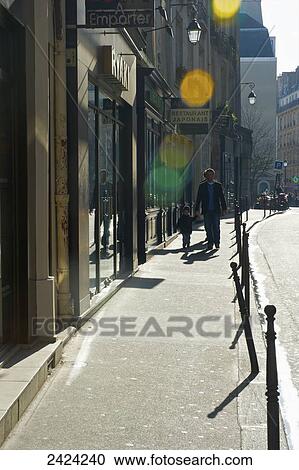 Pedestrians in the historial district of the Marais; Paris, France View Large Photo Image Stock Image - Pedestrians in the historial district of the Marais; Paris, France. Fotosearch