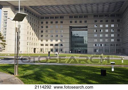 Pedestrians On A Path In Front Of Building With A Glass Entrance; Beijing China View Large Photo Image Stock Image - Pedestrians On A Path In Front Of Building With A Glass Entrance; Beijing China. Fotosearch