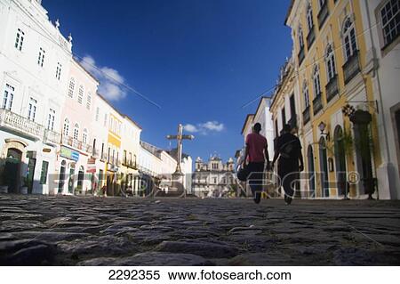 Stock Photography - Pedestrians on cobbled street; Salvador, Bahia State, Brazil. Fotosearch