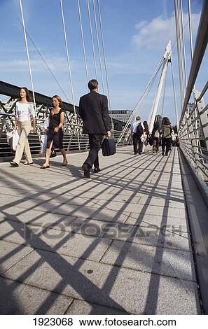 Pedestrians On Hungerford Bridge View Large Photo Image Stock Photo - Pedestrians On Hungerford Bridge. Fotosearch
