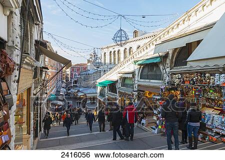 Stock Photograph - Pedestrians on Rialto Bridge; Venice, Veneto, Italy. Fotosearch