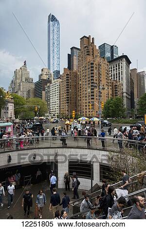 Pedestrians on steps and in a plaza; New York City, New York, United States of America View Large Photo Image Stock Photography - Pedestrians on steps and in a plaza; New York City, New York, United States of America. Fotosearch