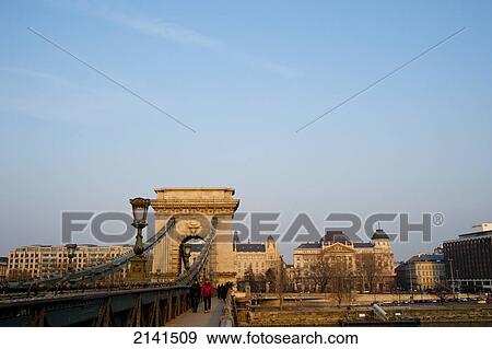 Stock Photo - Pedestrians Over The Chain Bridge, Budapest, Hungary. Fotosearch