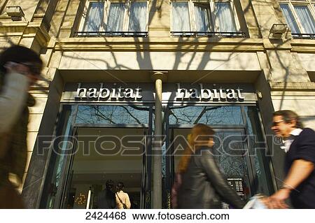 Pedestrians walk by a retail store; Paris, France View Large Photo Image Stock Photo - Pedestrians walk by a retail store; Paris, France. Fotosearch