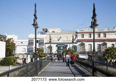 Pedestrians Walking And Talking On A Path; Chiclana De La Frontera Andalusia Spain View Large Photo Image Stock Image - Pedestrians Walking And Talking On A Path; Chiclana De La Frontera Andalusia Spain. Fotosearch