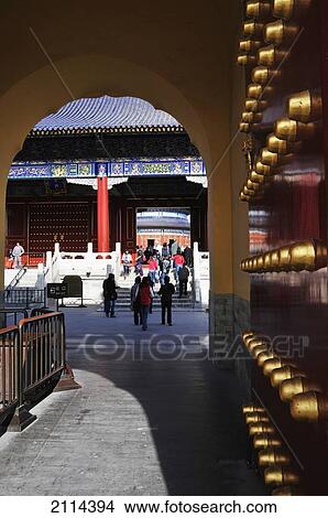 Pedestrians Walking On A Path Between Buildings With Unique Facade; Beijing China View Large Photo Image Picture - Pedestrians Walking On A Path Between Buildings With Unique Facade; Beijing China. Fotosearch
