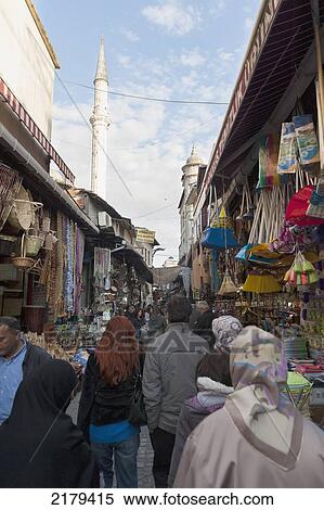 Stock Photography - Pedestrians Walking Through The Market Stalls; Istanbul Turkey. Fotosearch