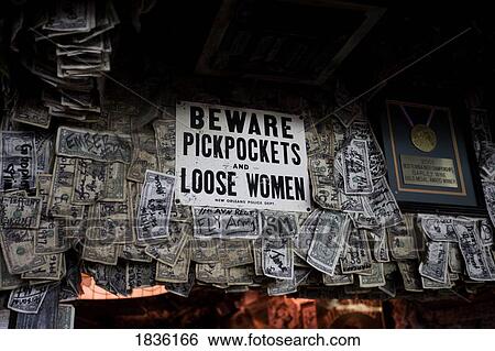 Stock Photograph - Pensacola, Florida, Usa; Antique Warning Sign In Restaurant Interior. Fotosearch