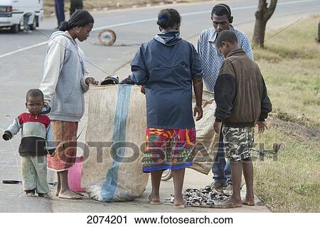 Stock Image - People Along The Road Between Ranohira & Ambalavao, Fianarantsoa Province, Madagascar. Fotosearch