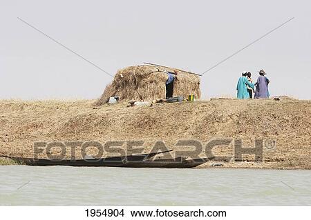 People along the shores of the Niger River between Mopti and Lake Debo, Mali View Large Photo Image Picture - People along the shores of the Niger River between Mopti and Lake Debo, Mali. Fotosearch