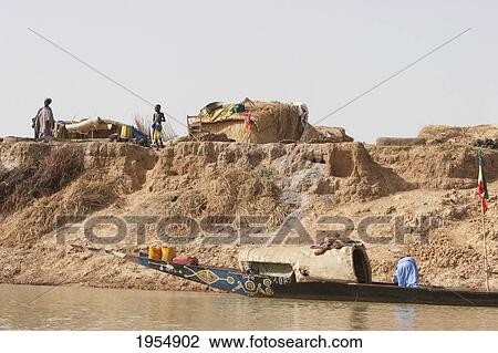 People along the shores of the Niger River between Mopti and Lake Debo, Mali View Large Photo Image Stock Image - People along the shores of the Niger River between Mopti and Lake Debo, Mali. Fotosearch