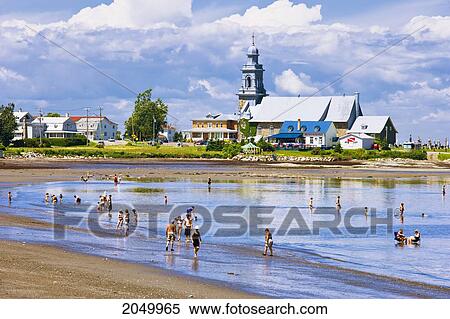 Stock Photography - People At A Beach, Bas-Saint-Laurent Region, Sainte-Luce, Quebec. Fotosearch