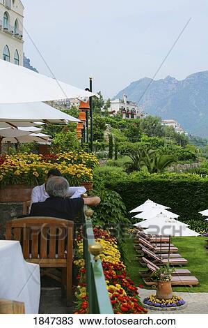 Stock Image - People At Cafe; Ravello, Italy. Fotosearch